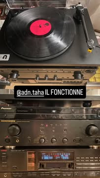 An Instagram story my friend sent me of his sound system, with the caption "@adn.taha IL FONCTIONNE" in the middle.